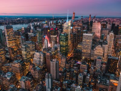 lighted high-rise buildings during golden hour