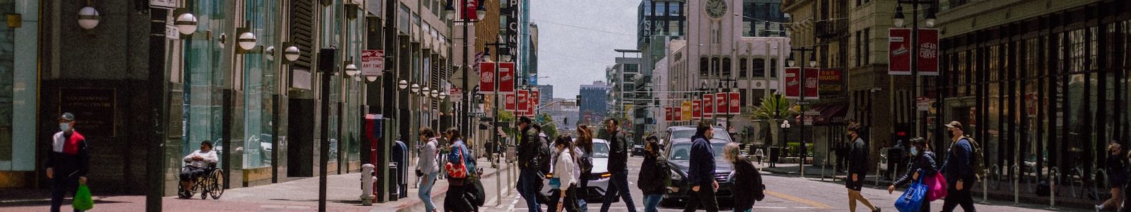 people crossing a street